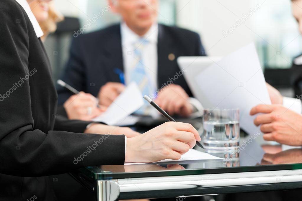 Employer meeting with legal counsel about immigration matters